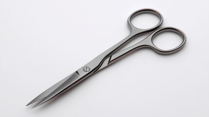 Obraz premium Precision Cut: A Close-Up View of Shiny Stainless Steel Scissors on White