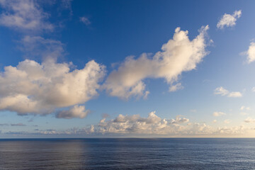 Beautiful Ocean View With Clouds in the Pacific Ocean Near Hawaii at Sunset