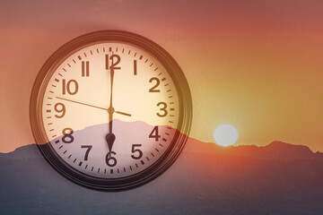 clock on the wall 6 AM morning sunrise wakeup, time management concept 