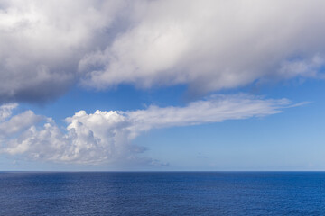 Calm Ocean with Blue Sky and Clouds over the Pacific Near Hawaii
