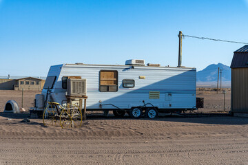 An old recreational vehicle in a New Mexico ranch