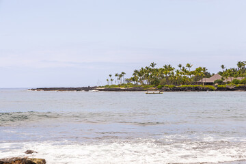 Scenic Coastal View of Kailua-Kona, Hawaii with Calm Waters and Palm Trees