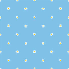 Seamless pattern with daisies on a blue background