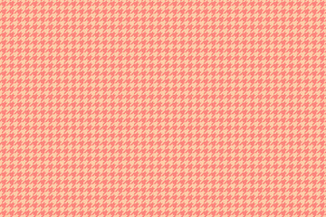 Elegant coral and peach houndstooth pattern.  Perfect for fashion, textile, or website backgrounds.  This classic design offers a sophisticated texture and subtle visual interest.