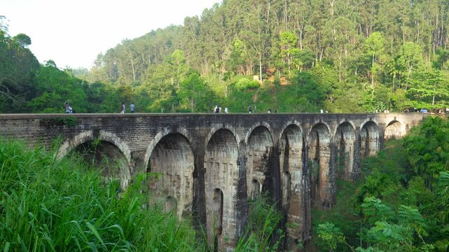 Nine arches bridge, historical landmark in sri lanka. Stand tall and majestic railway bridge amidst lush greenery. Stone arches and attracting tourists with its architectural. Construction structure