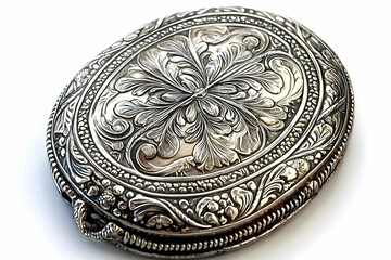 Antique silver locket detailed engraving floral design white background jewelry history