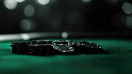 A stack of poker chips piled high on a green felt table, perfect for capturing the excitement of a game