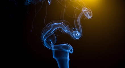 Naklejka premium Serpentine Blue Smoke Wisp Against Dark Backdrop With Golden Light Effect