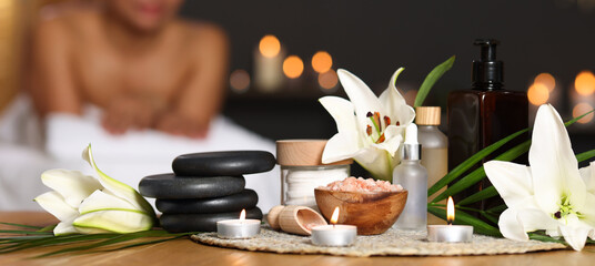 Woman relaxing on massage couch in spa salon, closeup