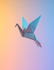 Origami bird mid-flight on gradient backdrop