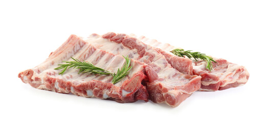 Fresh raw pork ribs and rosemary isolated on white