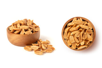 Roasted peanuts in wooden bowl isolated on white background.