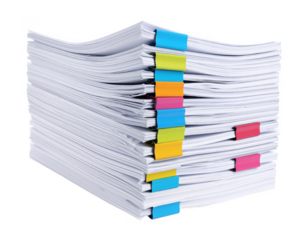 Brightly Colored Clips Hold Stacks of Documents in Organized Piles