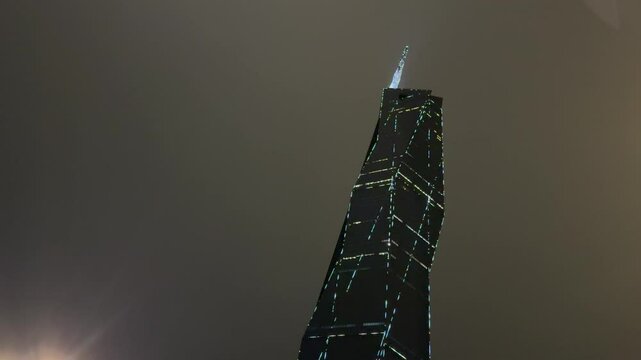the beautiful low angle view of merdeka 118 building from Petaling Street.  illuminated Merdeka 118 tower at night