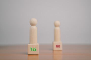 Wooden blocks show right and wrong signs, ideas, decisions, votes and yes or no. Business options...