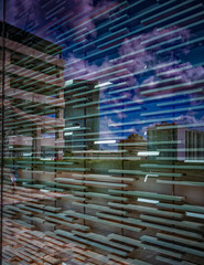 Blue and Tan Abstract Building Background with Reflections.