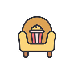 Cozy Movie Night Featuring An Armchair And Bucket Of Popcorn