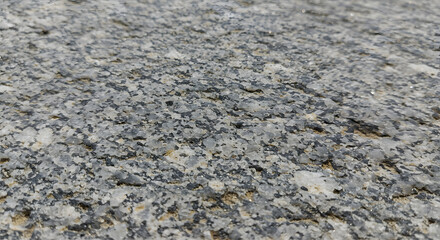 "Textura realista de pedra m&aacute;rmore branca com veios dourados, vista frontal, ilumina&ccedil;&atilde;o suave"

"Superf&iacute;cie de granito cinza com manchas pretas e brancas, textura detalhada e real"