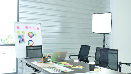 Office laptop business financial document chart and graph on wooden table with coffee cup. Flat lay notebook computer laptop office desk. No people business graph chart mockup on business workspace
