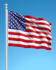 Fototapeta premium American flag waving proudly in the wind against a clear blue sky patriotic symbol of freedom and democracy
