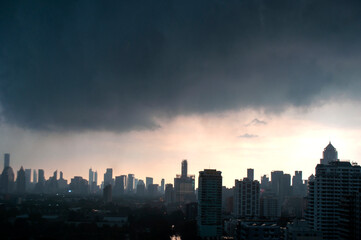 Cityscape of Bangkok on a Cloudy and Rainy Day – Urban Skyline with Overcast Sky and Wet Weather Atmosphere