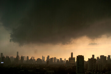 Cityscape of Bangkok on a Cloudy and Rainy Day &ndash; Urban Skyline with Overcast Sky and Wet Weather Atmosphere
