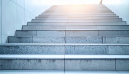 Fototapeta premium A beautifully crafted wooden staircase bathed in soft, warm light filtering through large windows, casting gentle shadows on the steps.