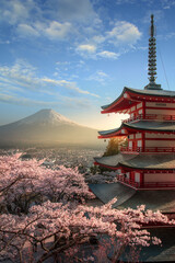 Fujiyoshida, Japan Beautiful view of mountain Fuji and Chureito pagoda at sunset, japan in the spring with cherry blossoms