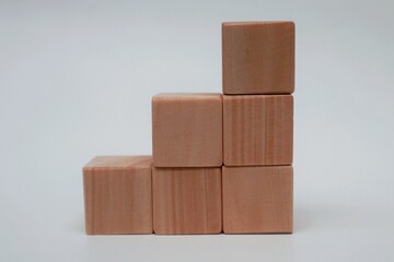 Stack of wooden blocks on white background
