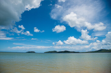 Turquoise ocean sea water white wave splashing deep blue sea. Bird eye view monster wave splash on rock. Tropical sea beach in summer seaside outdoor. Ocean island beautiful dramatic landscape.