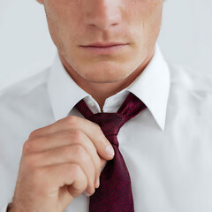 Man tying a necktie