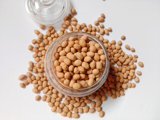 nuts and seeds. kacang madu or honey peanuts. atom peanut. egg peanut. honey peanuts are a popular snack in Indonesia made from peanuts coated with flour and spice dough. savory and crunchy.