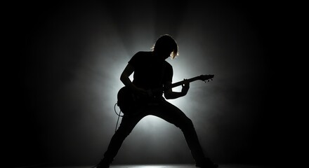 Guitar Player Silhouette in Smoke and Dark Background