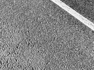 Fototapeta premium Background with asphalt texture. Road with markings. View from above. black and white