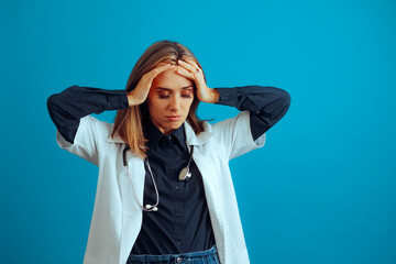 Stressed Doctor Feeling Overwhelmed and Upset. Medical professional works intensely and overtime...