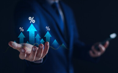Businessman holding graph with percentage, offer of shopping discount and tax concept, adjusting interest rate raising to fight inflation, returns on investment, business strategy