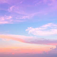 Fototapeta premium A breathtaking pink sky at dusk, adorned with fluffy white clouds, casting a warm glow over the horizon, creating a serene and dreamy atmosphere.