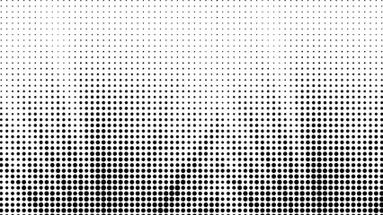 Black circles arranged in a gradient pattern fading from dense to sparse on a white background