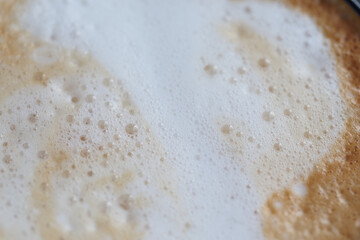 Delicious latte art creates creamy texture in warm coffee beverage