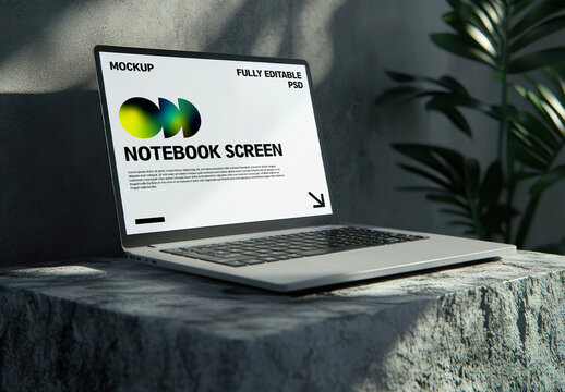 Laptop Screen Mockup on Stone Surface with Natural Shadows