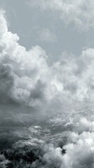 Obraz premium Cloudscape Mountains: A Serene Monochromatic Landscape