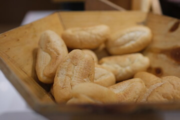 Bread rolls basket little roll breads in basket on table