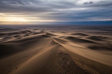 arafed view of a vast desert with a few clouds