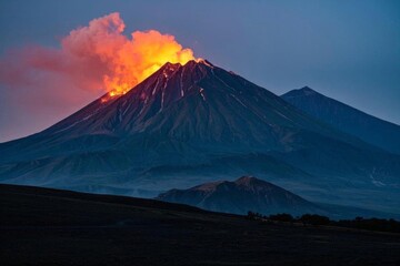 arafed mountain with a red and orange cloud in the sky