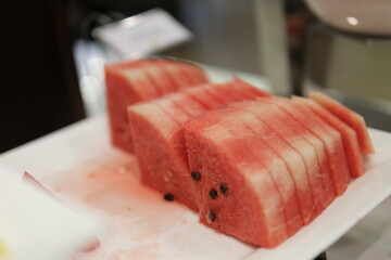 watermelon peeled into pieces Fresh watermelon cut into beautiful pieces. Delicious healthy snack