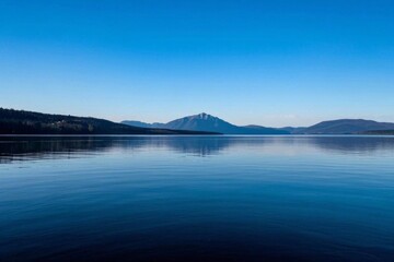 arafed view of a mountain range and a body of water