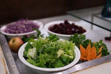 buffet salads cabbage Top view of salad bar with assortment of ingredients