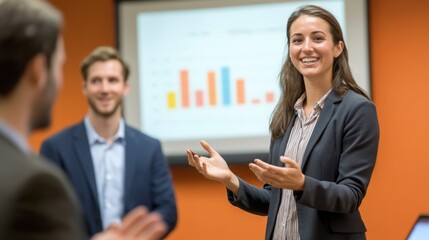 Fototapeta premium Engaging presentation with confident speaker in business meeting setting during daylight hours