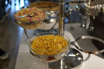 Cereal breakfast buffet Breakfast served with coffee, orange juice, croissants, cereals and fruits....
