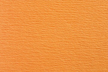 Smooth Light Orange Felt Fabric Background Texture Exuding Warmth and Elegant Softness